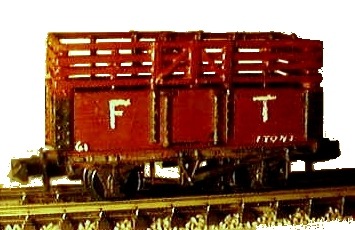 Model of a wagon fitted with a slatted frame for vegetable traffic